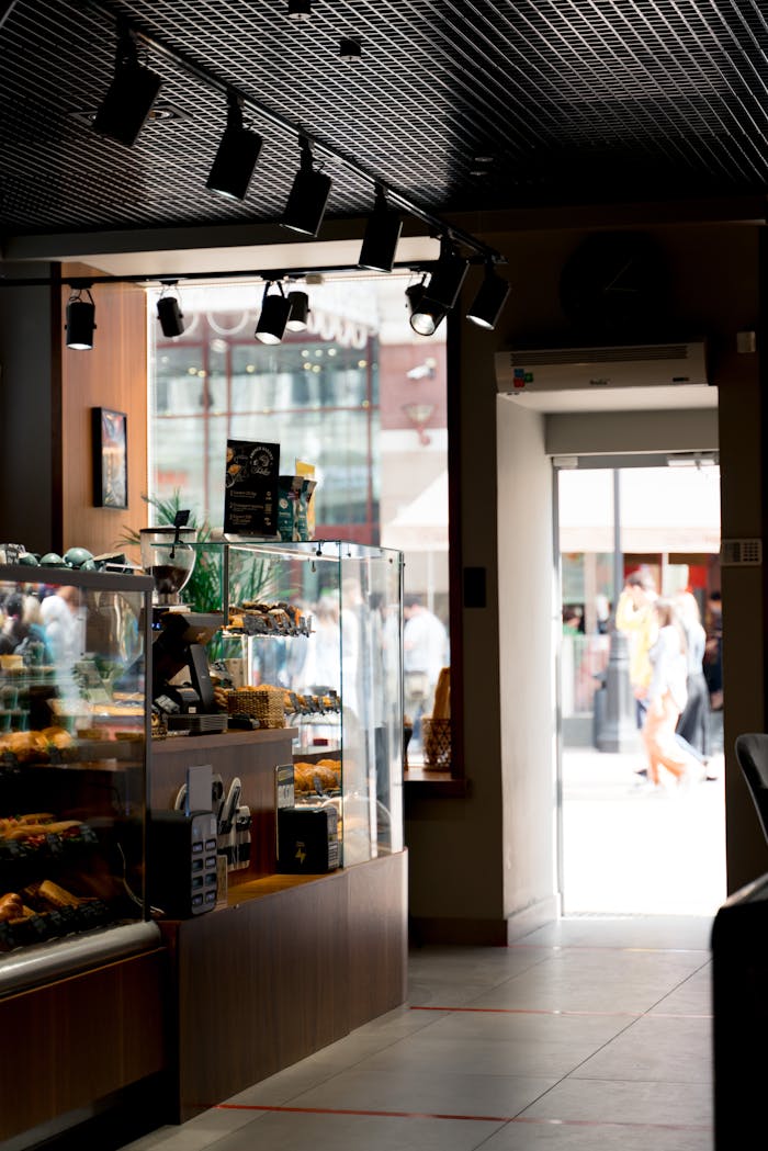 Modern café interior in Moscow with pastries and stylish design elements.